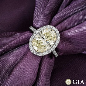 Platinum Fancy Light Yellow Oval Cut Diamond Ring 4.23ct